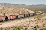 Union Pacific C40-8W #9379 (with SD60M's 6255 & 6311) begins its slow descent down Cima Hill in full dynamic braking 